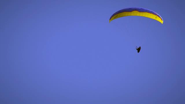 2 People Paragliding