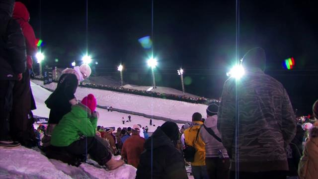 Audience Watching People Skiing