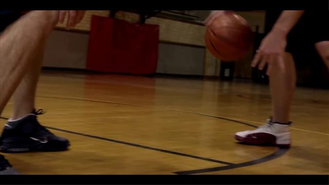 Close Up Of People Playing Basketball