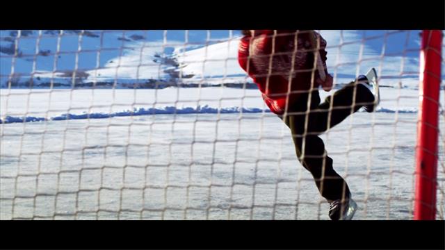 Slow Motion Of Man Playing Ice Hockey