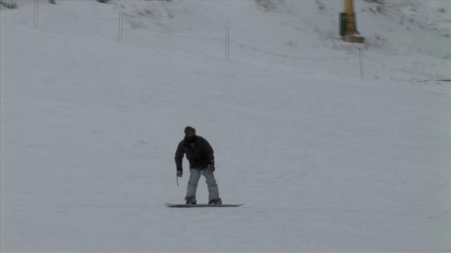 Snowboarder On Snow