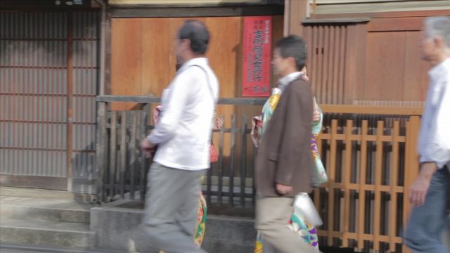 2 Japanese Women In Gion Kyoto Wearing Bright Colored Kimono’s
