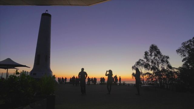 A Beautiful Sunset At The Mount Loft Viewpoint With People’s Sillohoutes