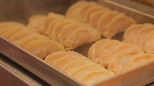 Close – Up – Gyoza’s Cooking At Japanese Restaurant